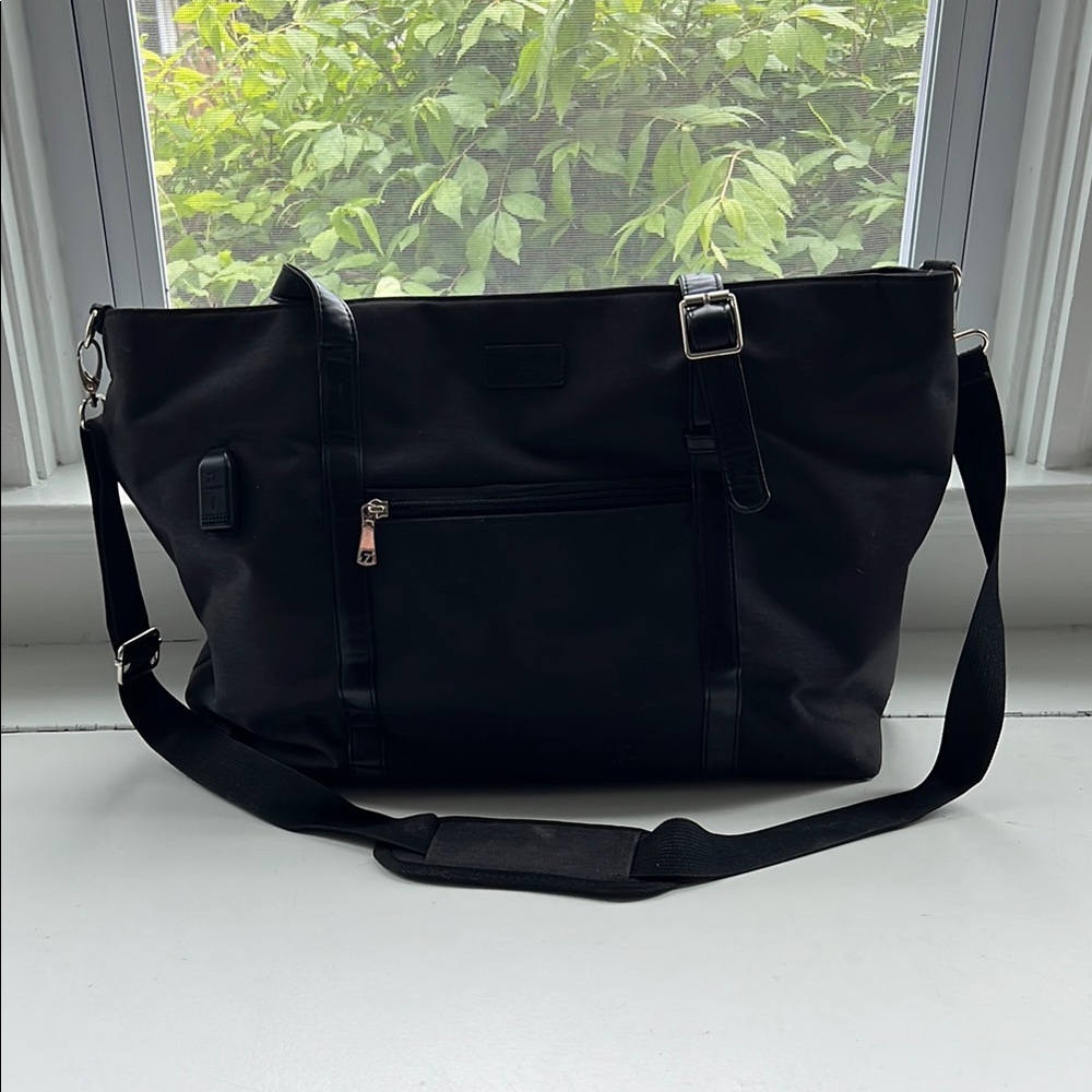 Black Laptop Bag with Adjustable Strap and Structured Design